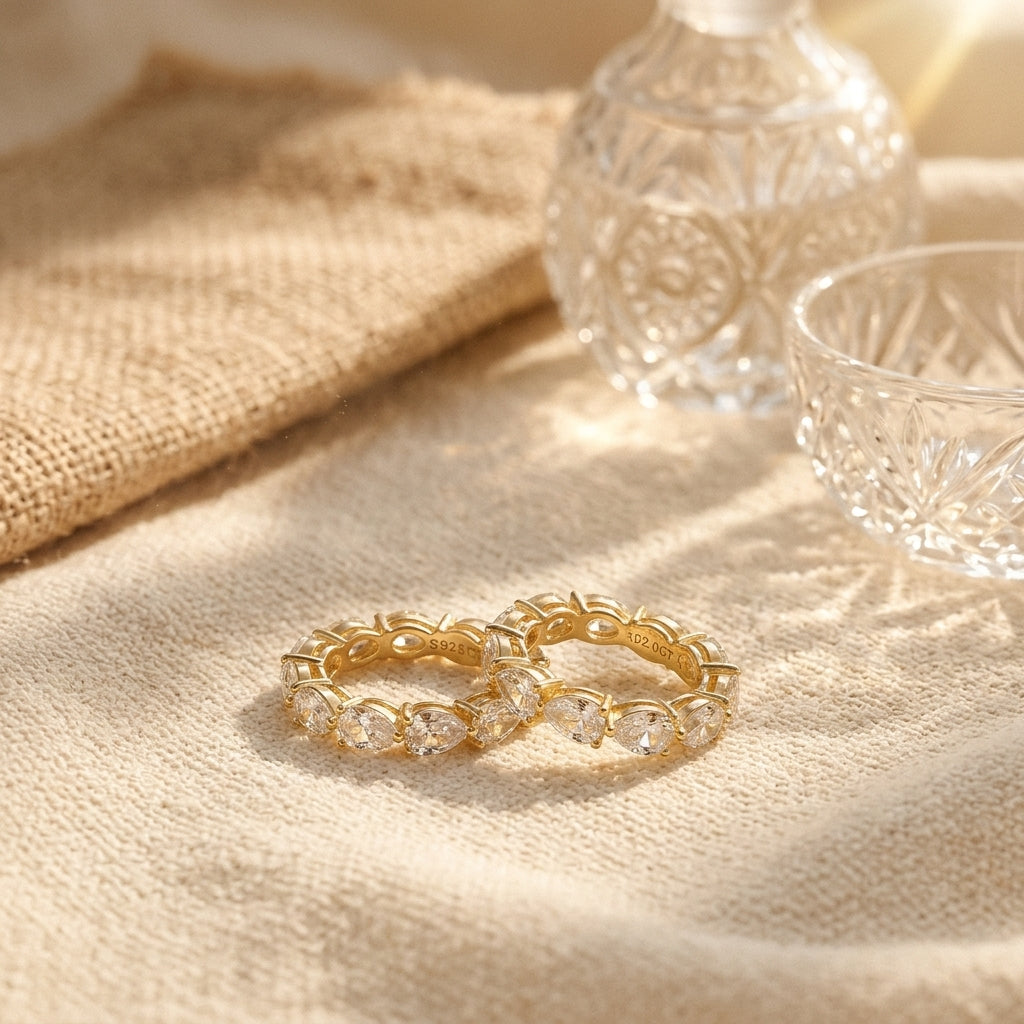 Moissanite Three-Prong Teardrop Ring