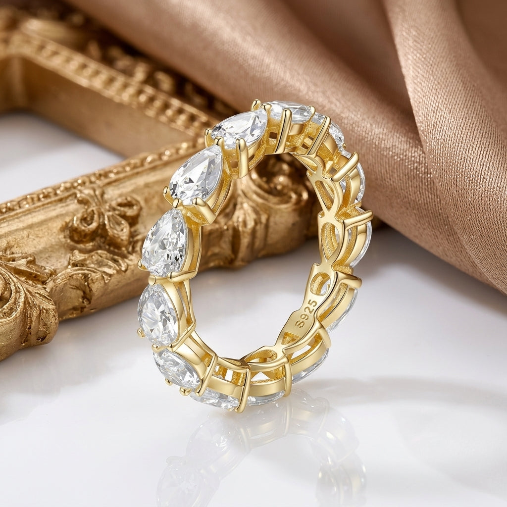 Moissanite Three-Prong Teardrop Ring