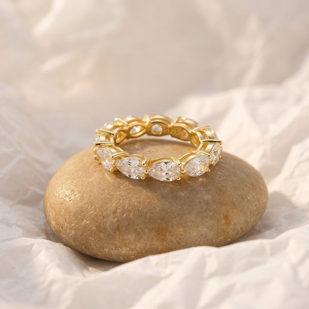 Moissanite Three-Prong Teardrop Ring