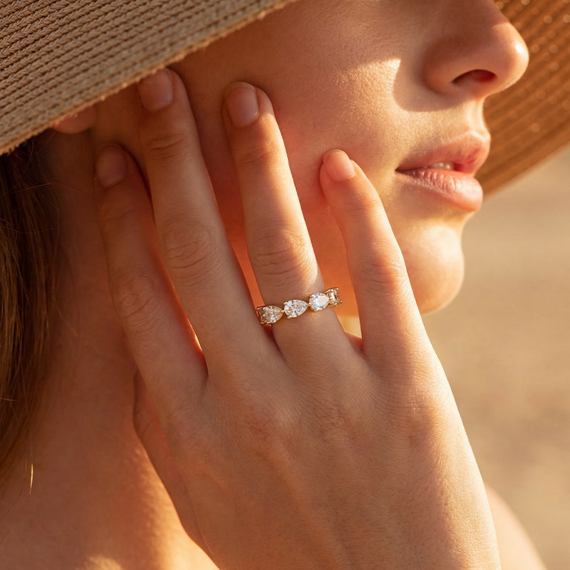 Moissanite Three-Prong Teardrop Ring