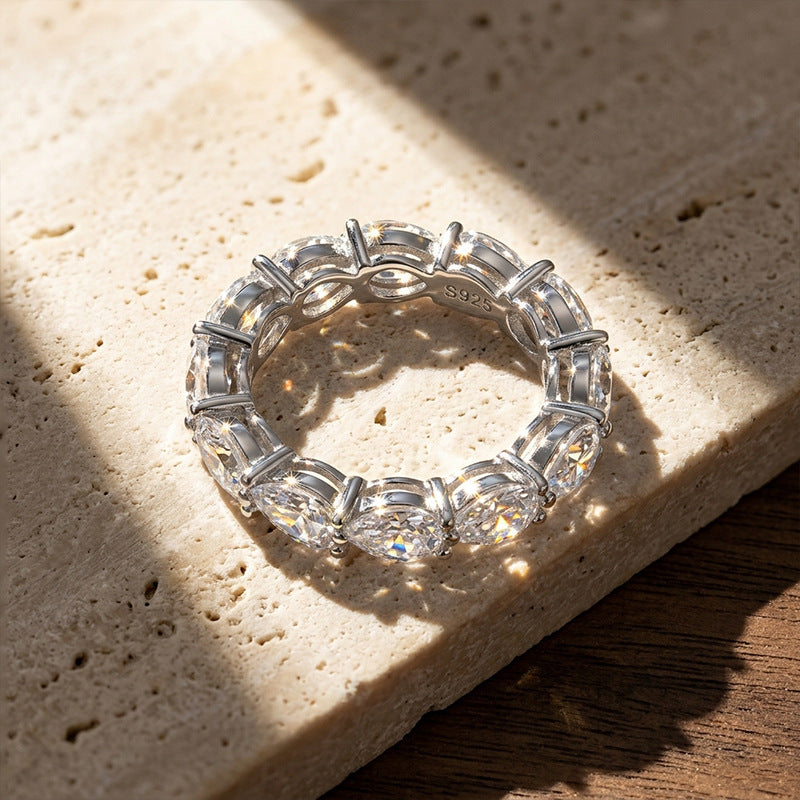 Moissanite Three-Prong Teardrop Ring
